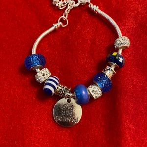 Blue and white charm bracelet.